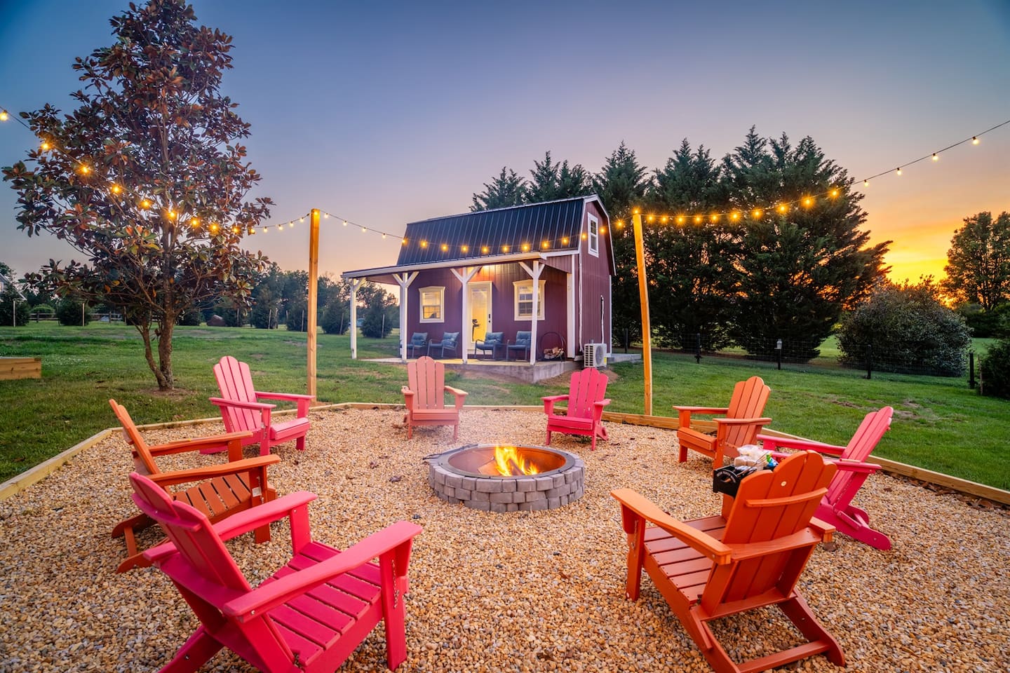 Relax around the fire pit with Adirondack seating, mountain views, and unforgettable sunsets.