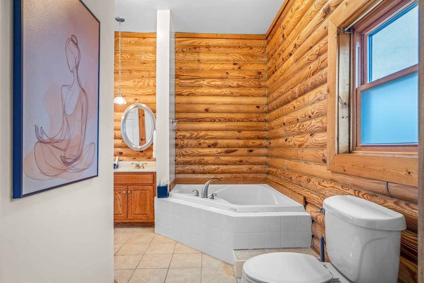 End the day with a soak in the tub surrounded by cozy log-cabin charm — your own little spa moment.