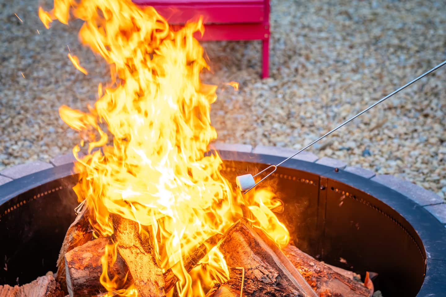The complimentary s'mores kit over the fire pit after a long day in the mountains.