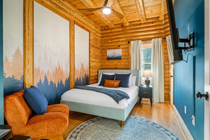 A comfortable queen bedroom with a peaceful, private layout