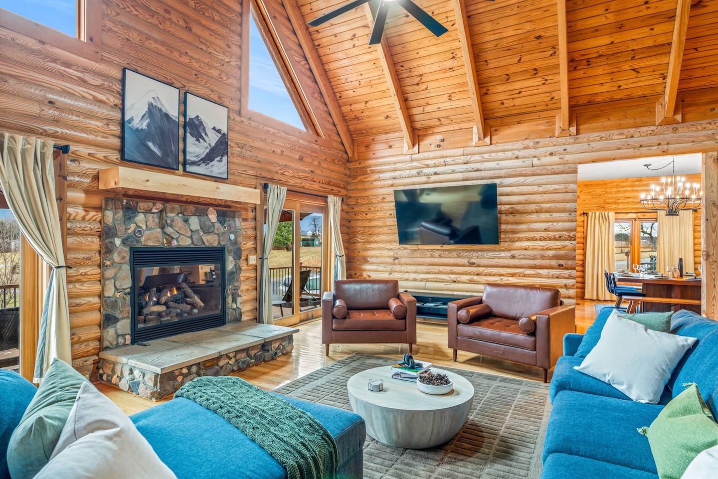 The grand stone fireplace is the heart of the lodge, where everyone gathers for morning coffee and evening wind-downs.