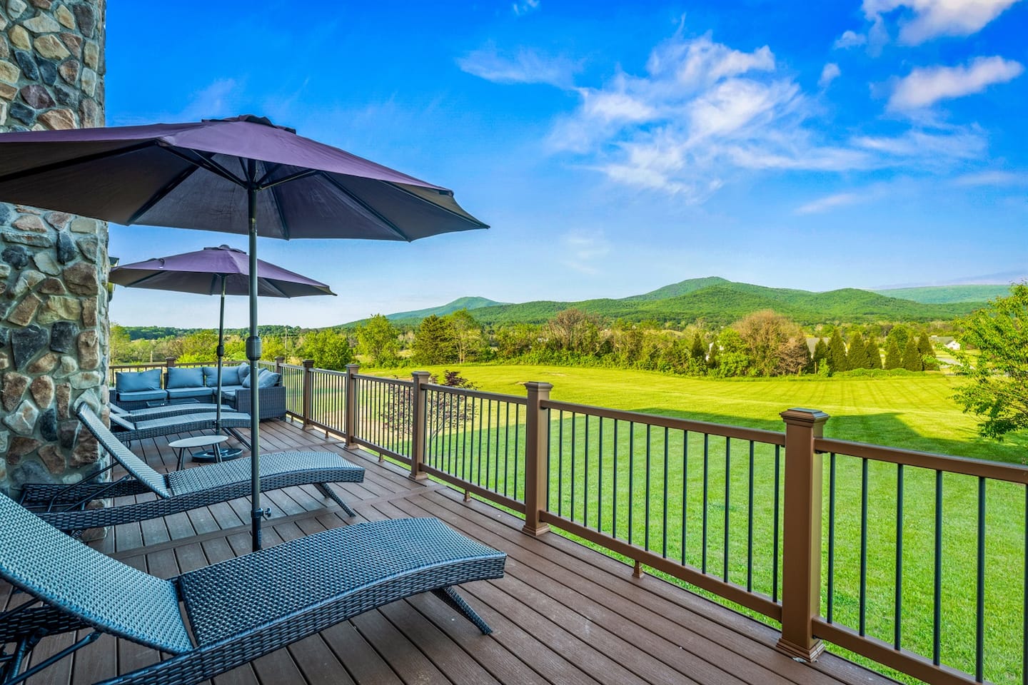 Sweeping mountain views and green space from your private deck — the spot for morning coffee or golden hour.
