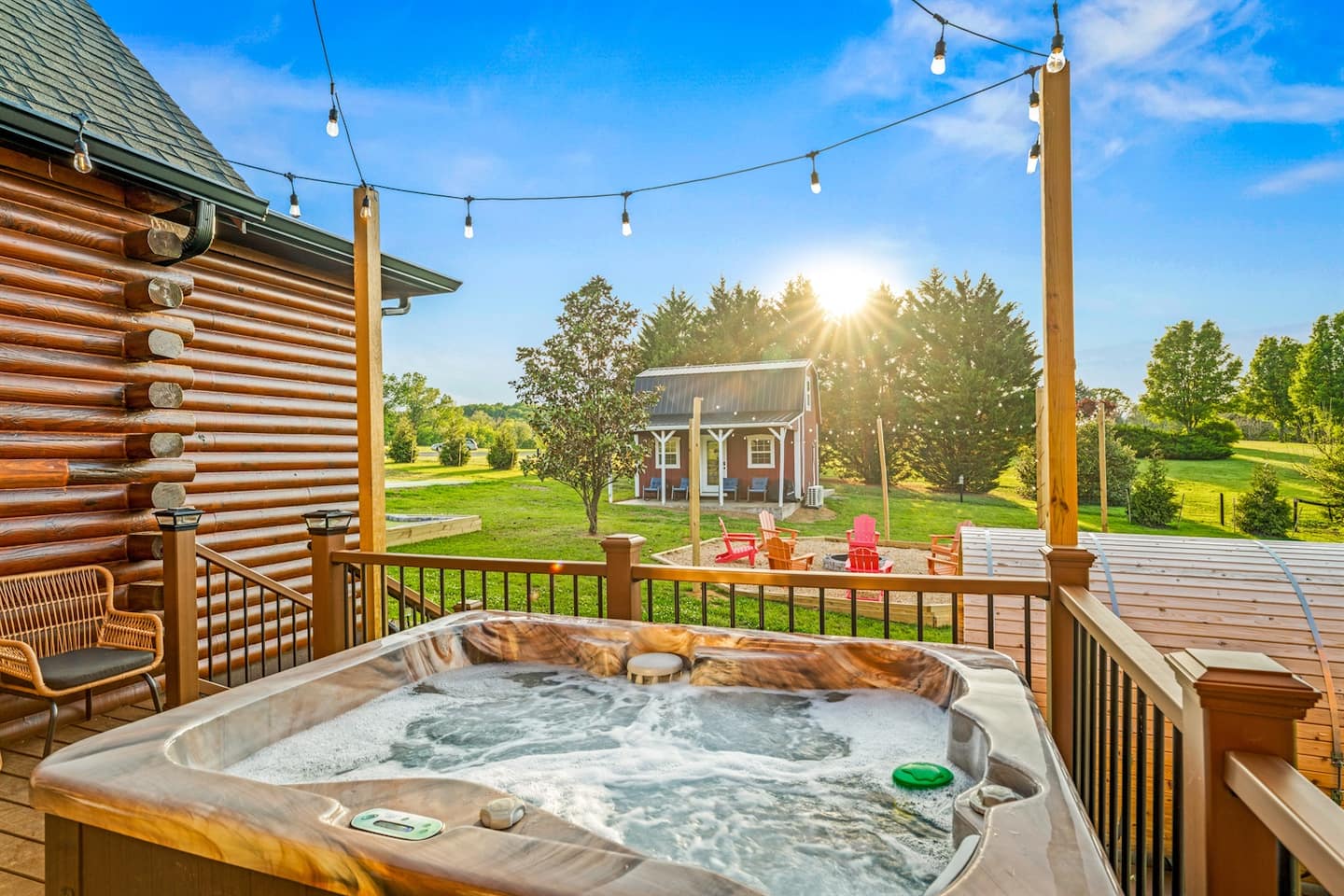 The private hot tub under soft lights — the perfect night in beneath the mountain sky.