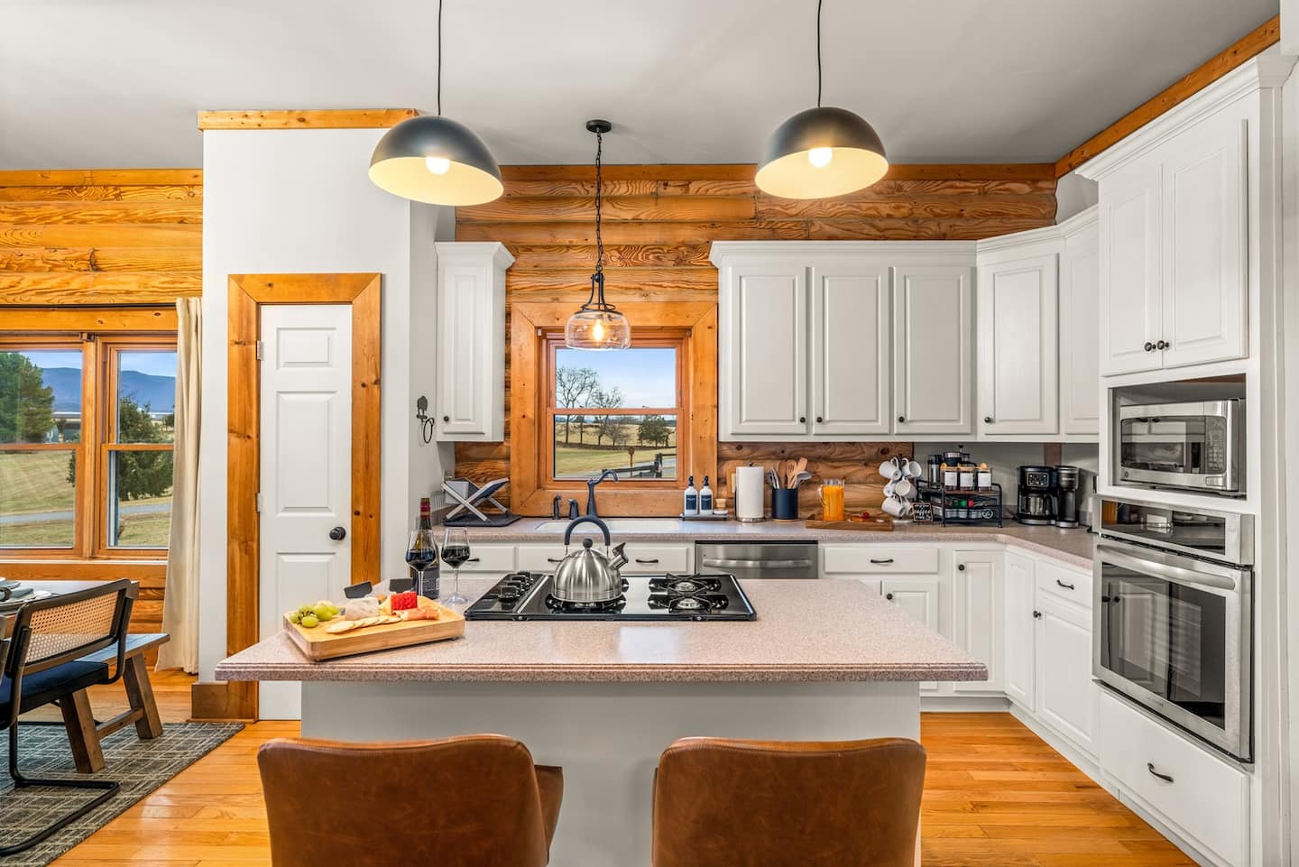 A fully equipped kitchen ready for cooking-for-a-crowd, with stainless appliances and generous counter space.