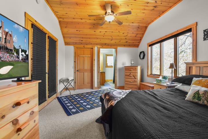 Our Primary bedroom features a king sleep number bed, full ensuite bathroom and a TV.