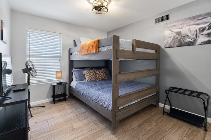 Queen bunk beds provide a fun "sleep-over" atmosphere!  Full closet w/hangers & luggage rack along with a storage cabinet means no tripping over suitcases!  32" TV allows for late night binge watching.  Portable fan & ceiling fan top off the comfort.