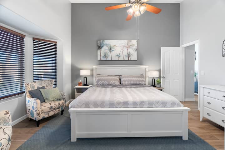 Huge King Size bed with memory foam mattress, comfortable lines & pillows provide a great night's rest. Accent chairs allow a relaxing area for late night private conversations.  Ample storage provided with full dresser & walk-in closet with hangers.