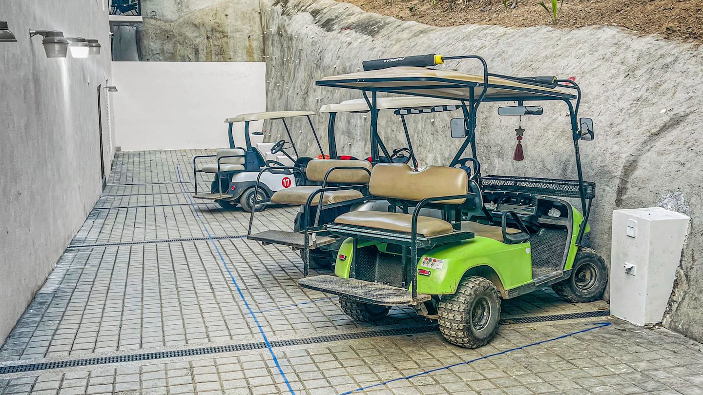 Rent a golf cart and park & charge it right on site, one less thing to plan.