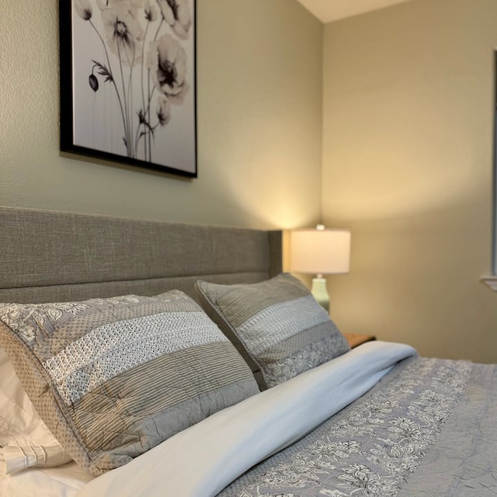 Bedroom Retreat: Discover serene elegance with plush bedding and soft lighting for restful sleep!