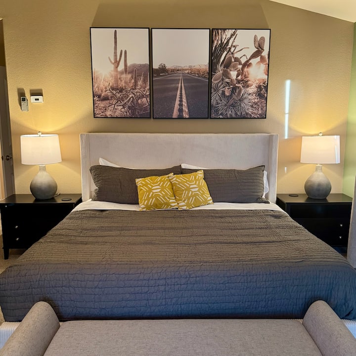 Master Bedroom: Unwind in style with inviting plush king bed, and inviting mountain views!