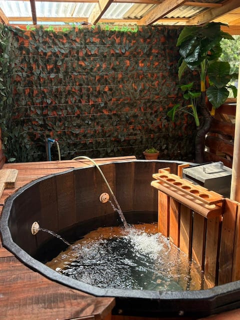 Cabin with tinaja (traditional wooden soaking tub) and private quincho (outdoor grill)