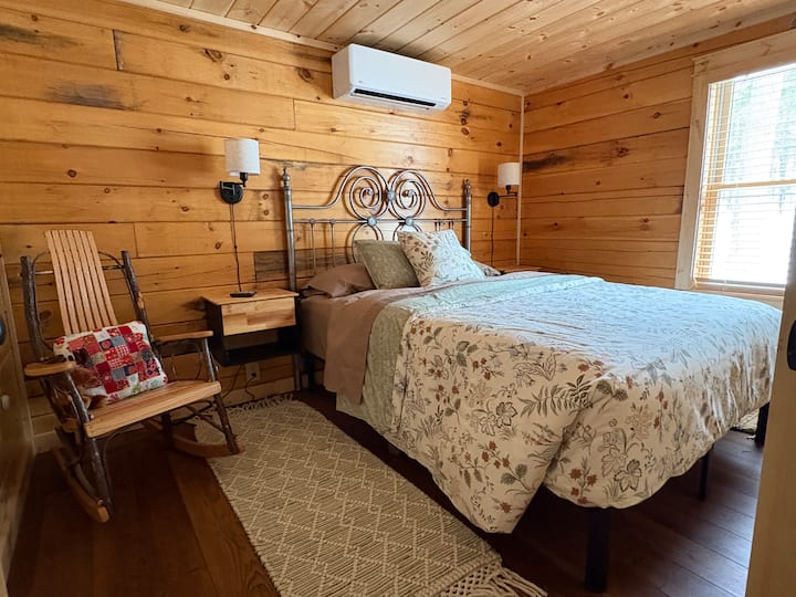 Comfy cozy Queen bed.  Mini-splits in every room with easy to use remotes for absolute control.  