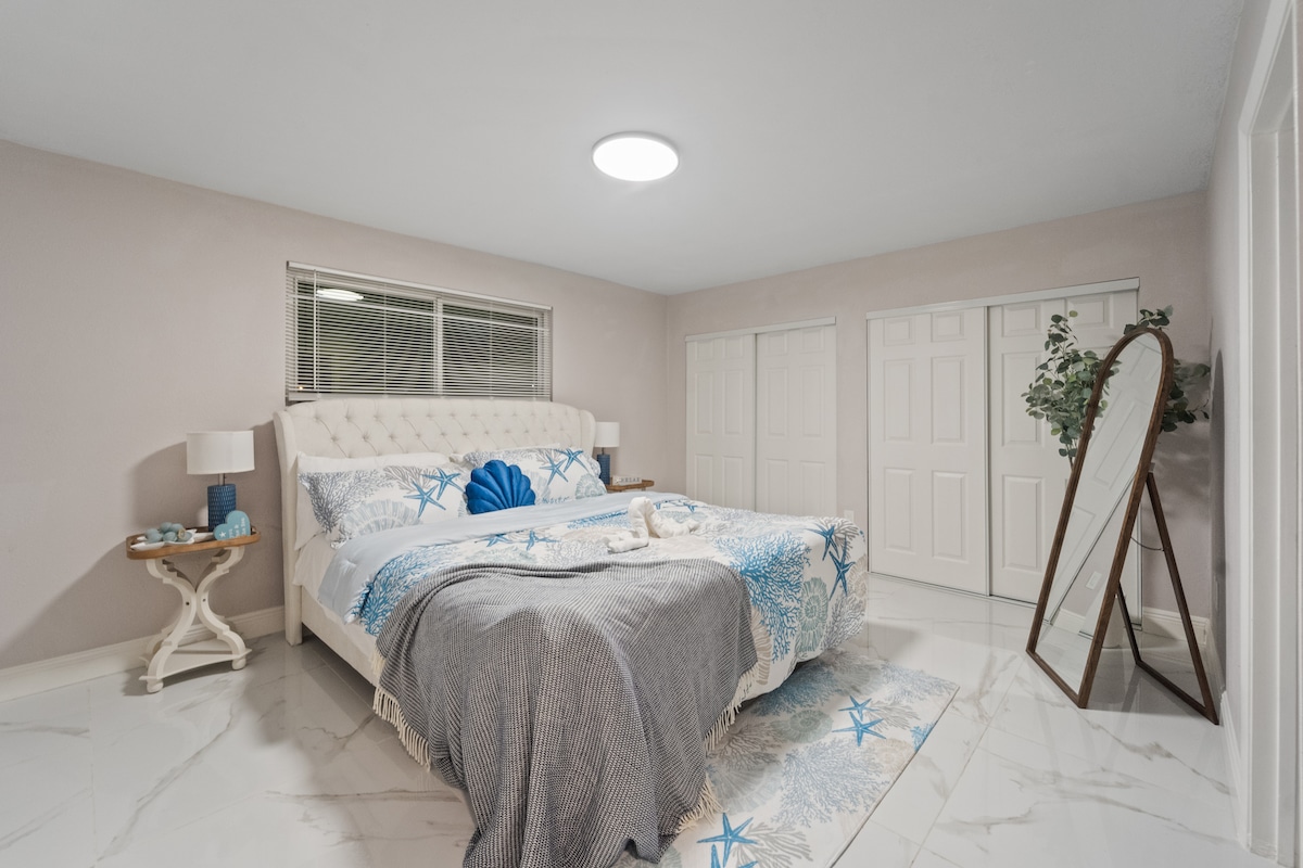 Coastal calm meets cozy charm. Drift off in this beach-inspired retreat with soft textures, seafoam blues, and starfish dreams.