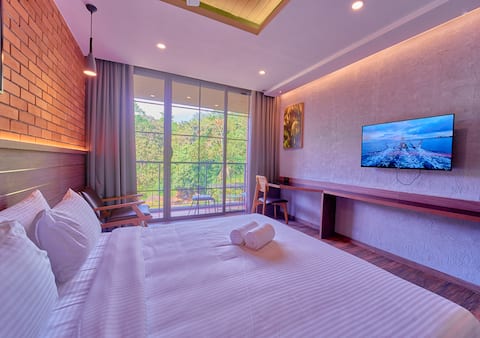 Room in Munnar | Nature Stay with Pool and Balcony