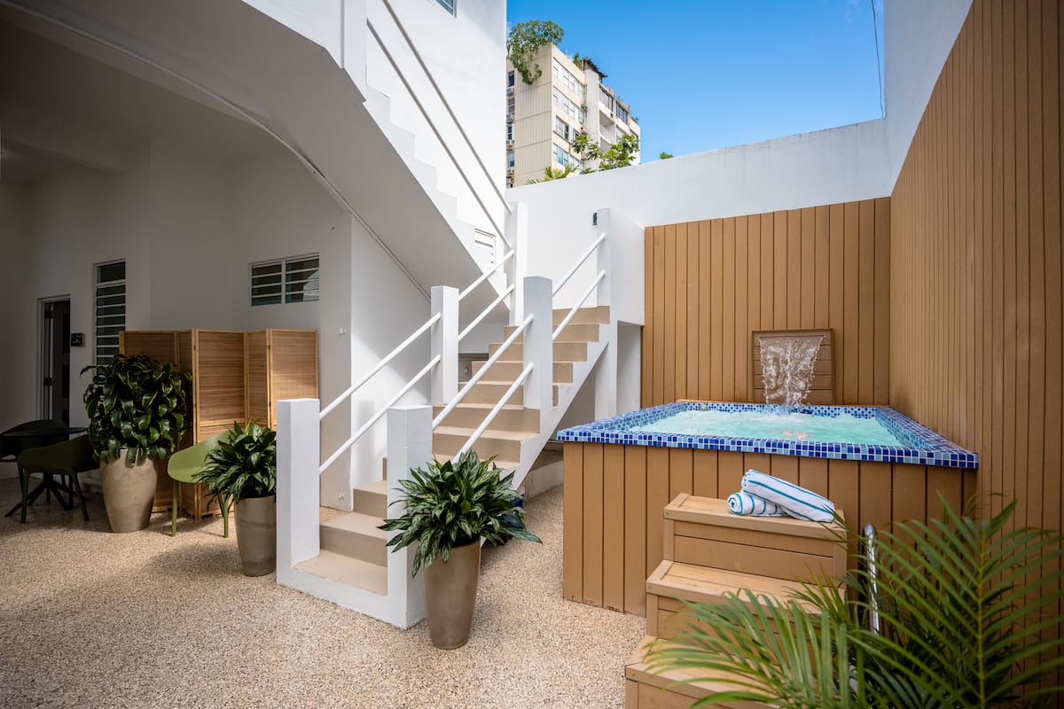 Urban Beach House Bailarina shared pool and courtyard