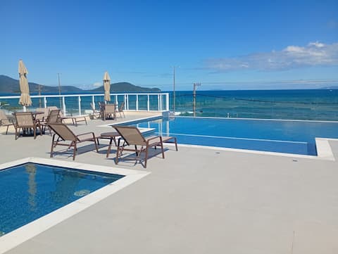 Top performing Airbnb: new apartment 99m2 comfortable and on the sand in Caraguatatuba