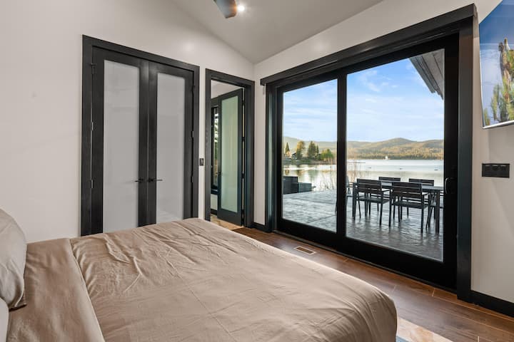 Bedroom 2 Downstairs - King Bed with lakeview, TV, ceiling fan, patio access; full bath (2 ppl)