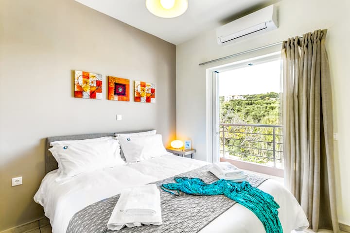 Second Floor - Bedroom 2 with 2 single beds (convertible to king upon request) and private balcony