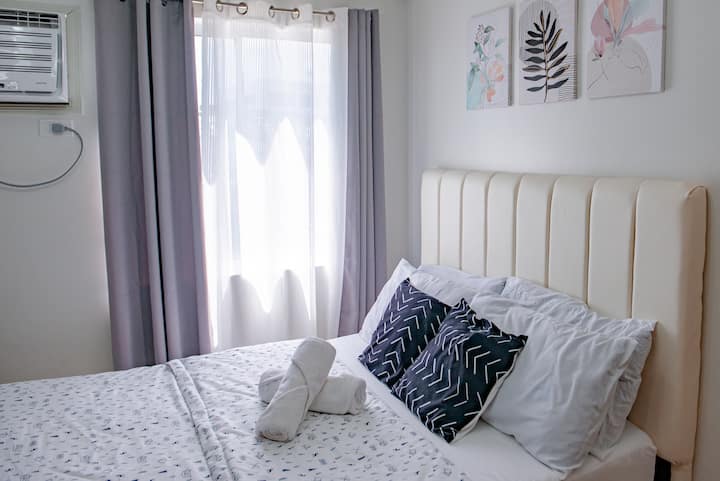 Enjoy fresh linens, soft pillows, and a relaxing ambiance designed for comfort after a long day in Davao City.
