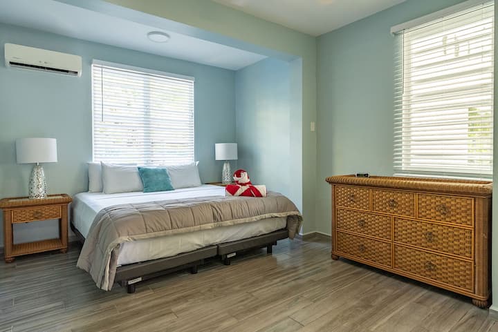 Suite 1: Primary bedroom with en suite bathroom
