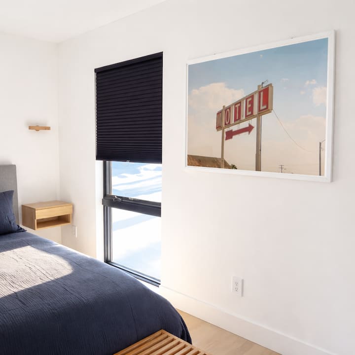 Bedroom Light & Art
Simple design, blackout shades, and calm artwork. Easy to sleep in, easy to wake up rested. Avocado Mattress and Organic sheets.