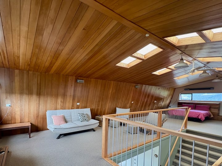 Queen bed and sofa that folds out to a comfy double bed on the open plan mezzanine.
