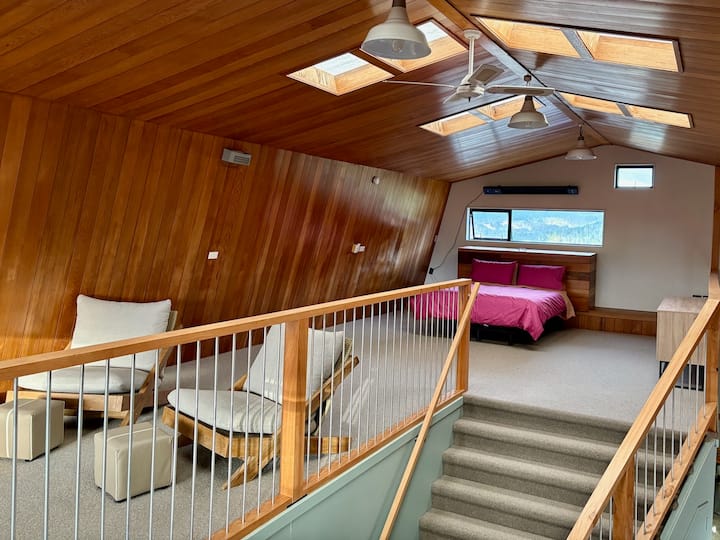 At the other end of the mezzanine, you have huge, comfy chairs and the second sofa.