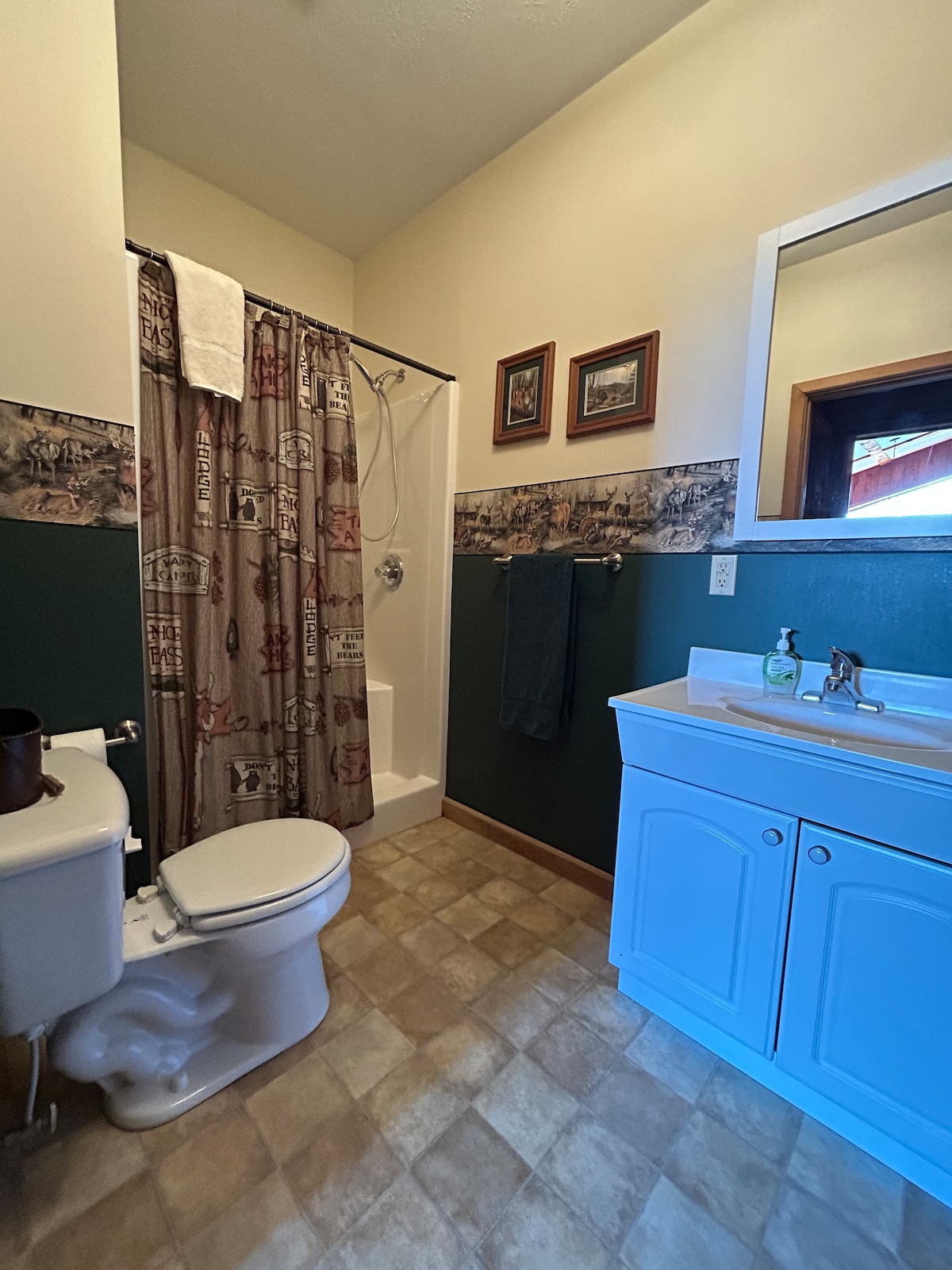 Full Bathroom 4 — Blue Vanity, Shower & Toilet