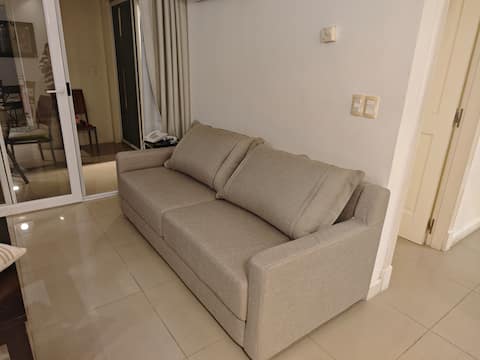 Top performing Airbnb: Luxurious apartment in Solanas. Ground floor overlooking the lake in Punta Ballena