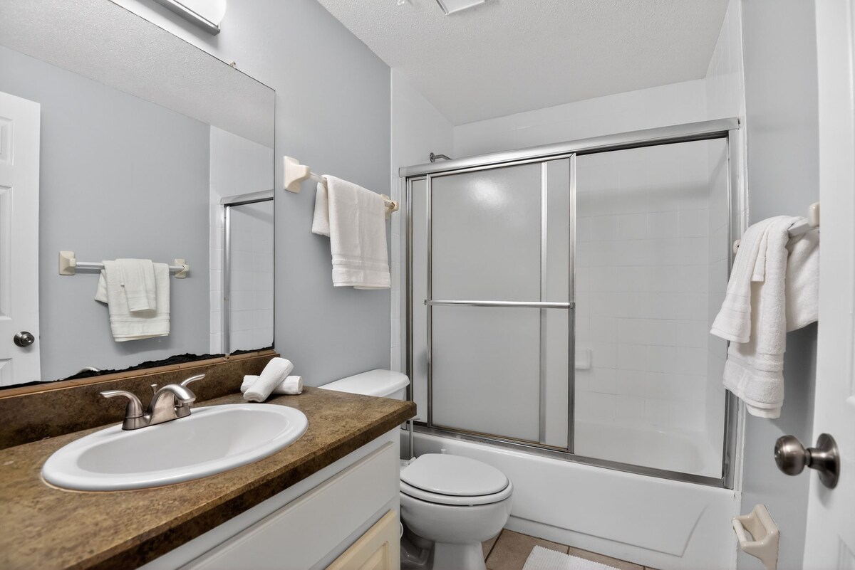 Free Parking & Laundry | Backyard | Highway Access