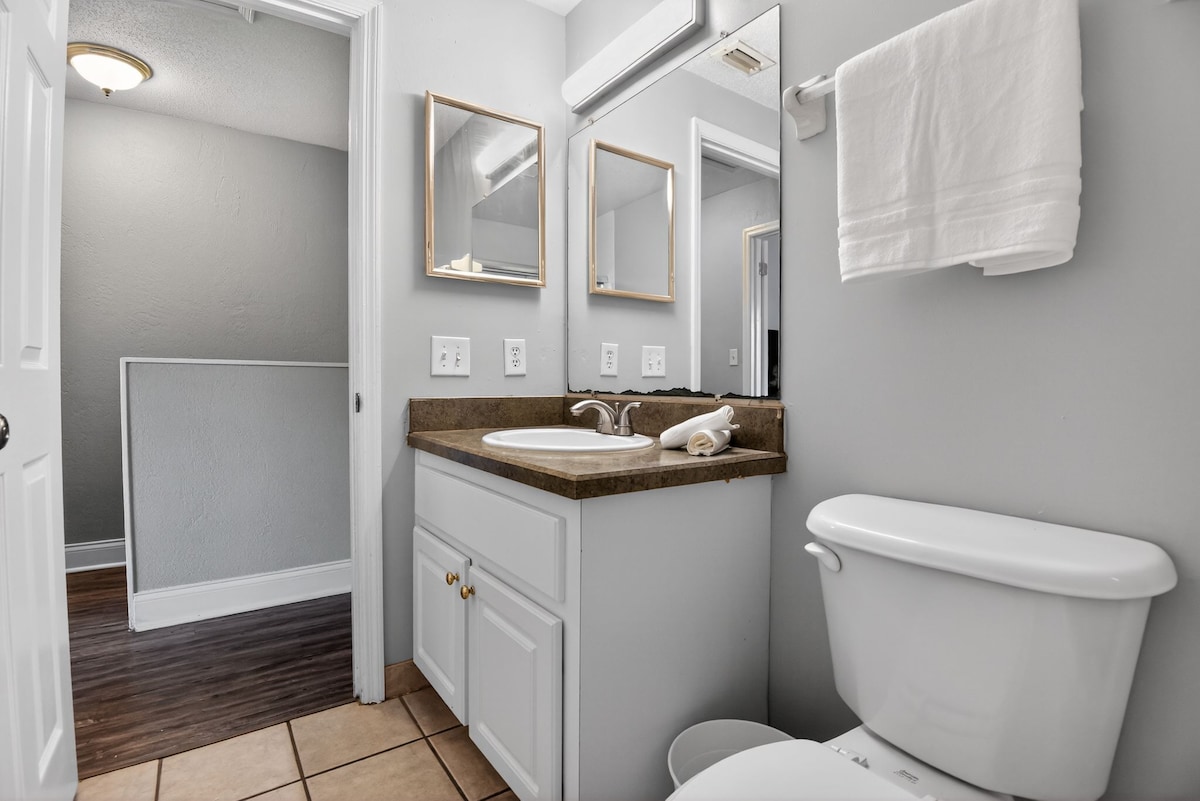 Free Parking & Laundry | Backyard | Highway Access