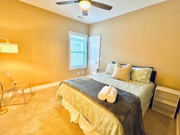 Third bedroom features a smart tv and walk-in closet, and has separate a faucet and sink from the Jack-and-Jill shared bathroom. 