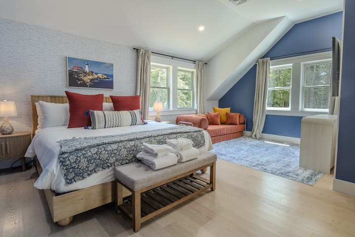 Third bedroom offers a plush king bed and a cozy sofa, capable of converting into a floor bed for additional sleeping arrangements.  Perfect for your little ones.