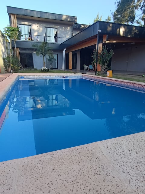 Large Residence/Sunset of the Paraná