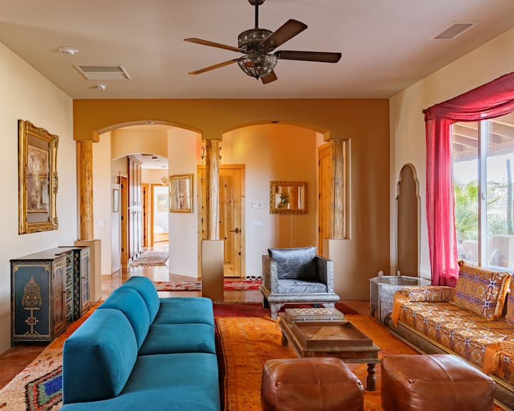 Moroccan-inspired living room with warm desert tones and soft natural light.