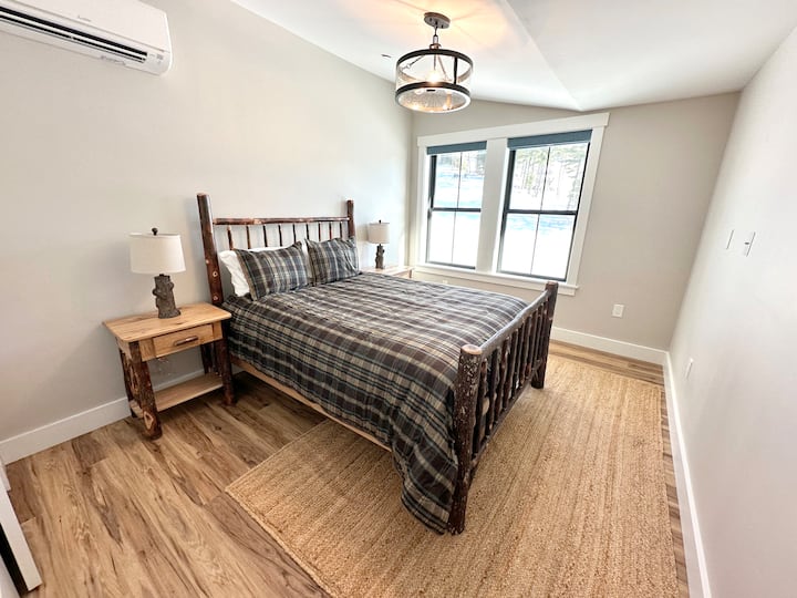The 2nd bedroom upstairs includes a queen bed and attached bath.