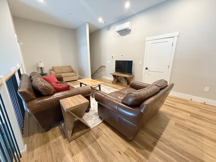 The beige sofa is a sleeper sofa!