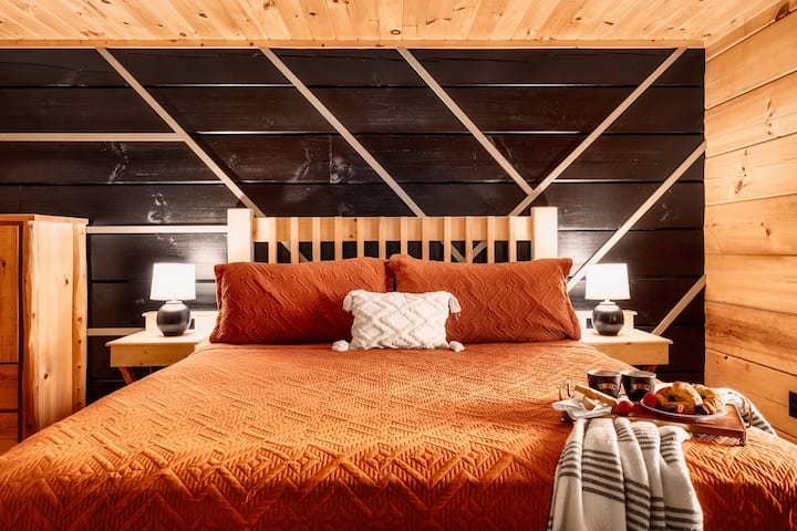 King master bedroom with a private bathroom - cozy, comfortable, and perfect for parents to unwind.