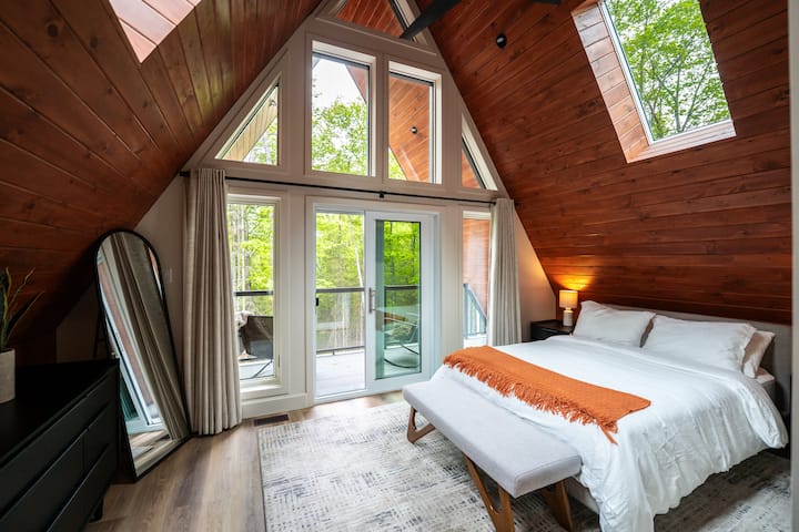 Master bedroom with private ensuite and outdoor deck.