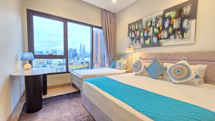 1 king bed and 1 single bed looking at KLCC, KL tower and KL118