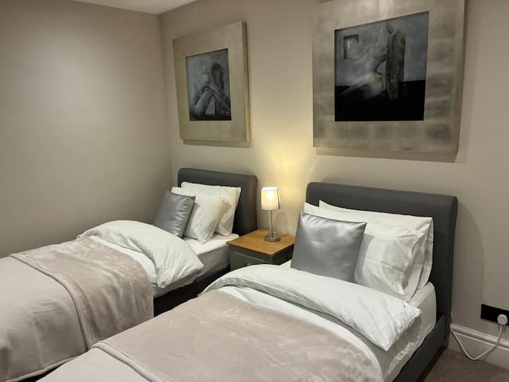 Second bedroom with two single beds