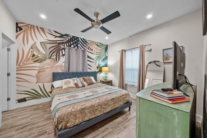 Beautifully designed Master bedroom with King suite, Smart TV, full length mirror, attached full bath room with biden, books, beach towels.