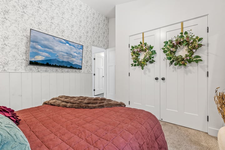 A built-in privacy retreat. This room offers a spacious double closet and a large TV, perfect for sneaking away from the group for some much-needed quiet time, a quick nap, or your favorite evening show.