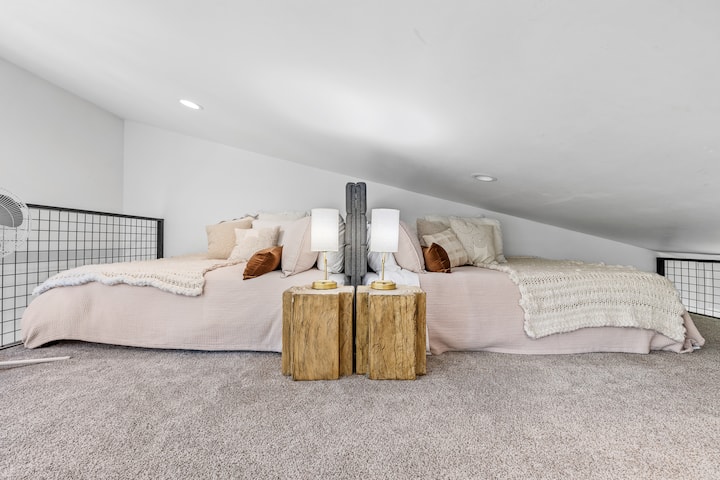 The loft features a two queen size beds styled as oversized daybeds. While available for extra sleeping flexibility, it doubles as a massive, ultra-comfortable daytime lounge to relax and play.