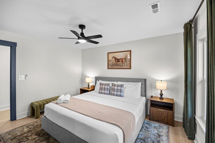 Recharge in this spacious main floor bedroom with luxury hybrid king mattress.
