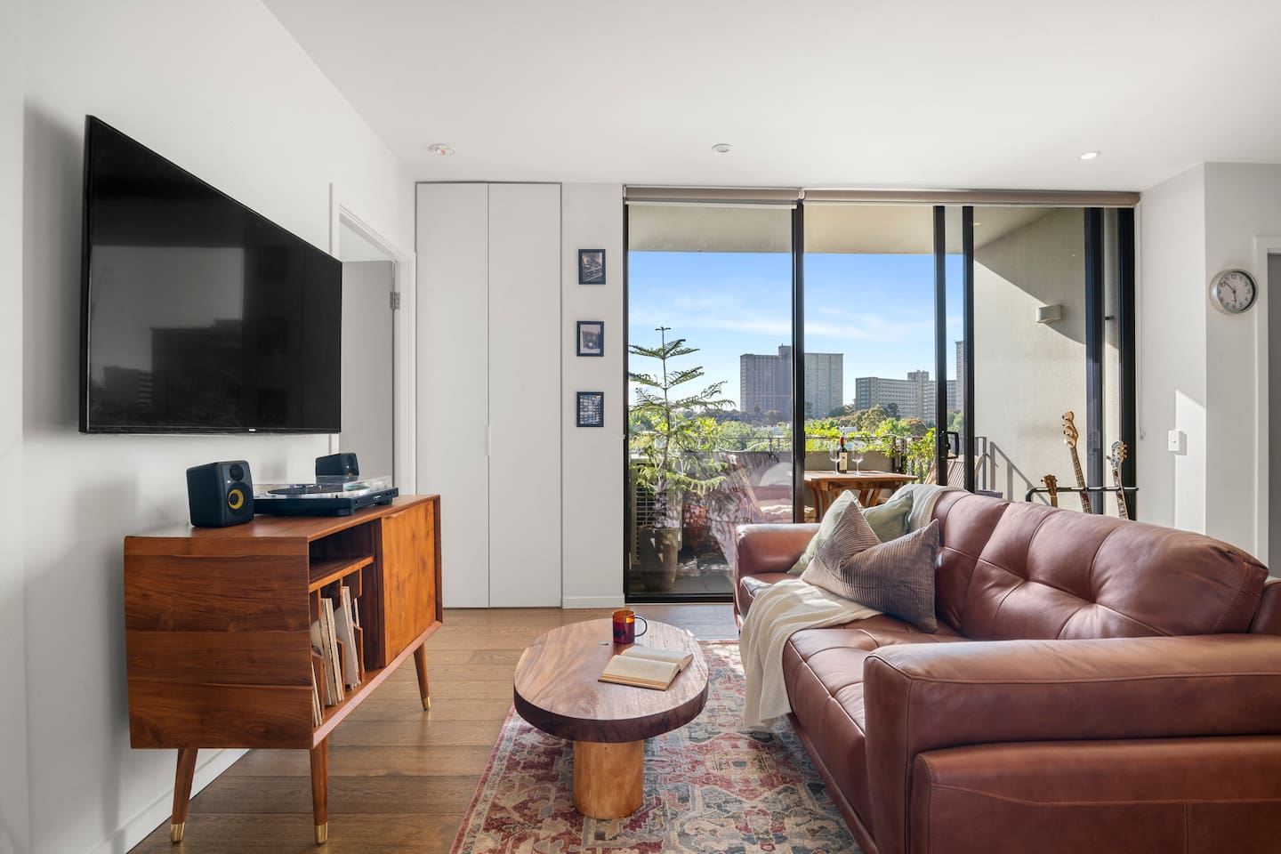 Relax on the comfortable couch with your choice of UHD television or some relaxing music on the record player.