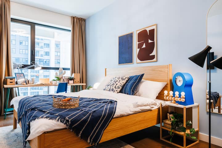 [Bedroom] Blackout curtains create a cozy environment for relaxation