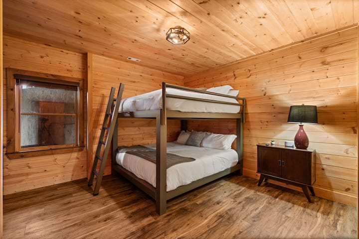 King-Over-King Bunks with TV in Room (Full Bathroom with Shower Attached); adjacent to game room on lowest floor
