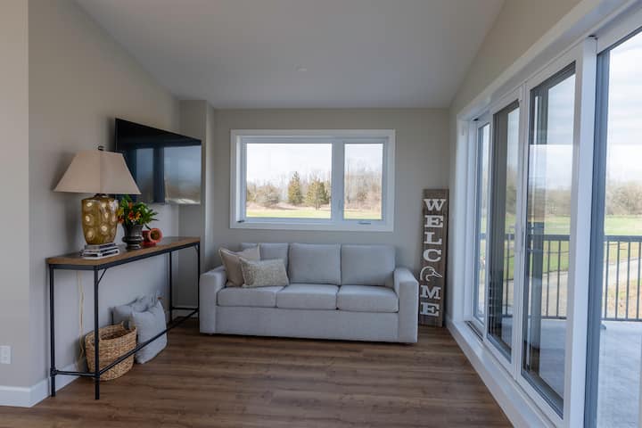 Loft. Pullout queen sized couch with deluxe mattress.  Substitutes as a kids play zone (on a rainy day) as well with the tv and board games located here.