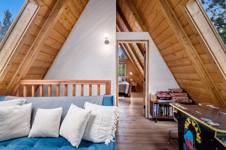 Loft lounge + game room - fun for kids and nostalgic for adults.